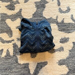 Kerrits girls navy horse riding shirt with silver and white horse shoe print